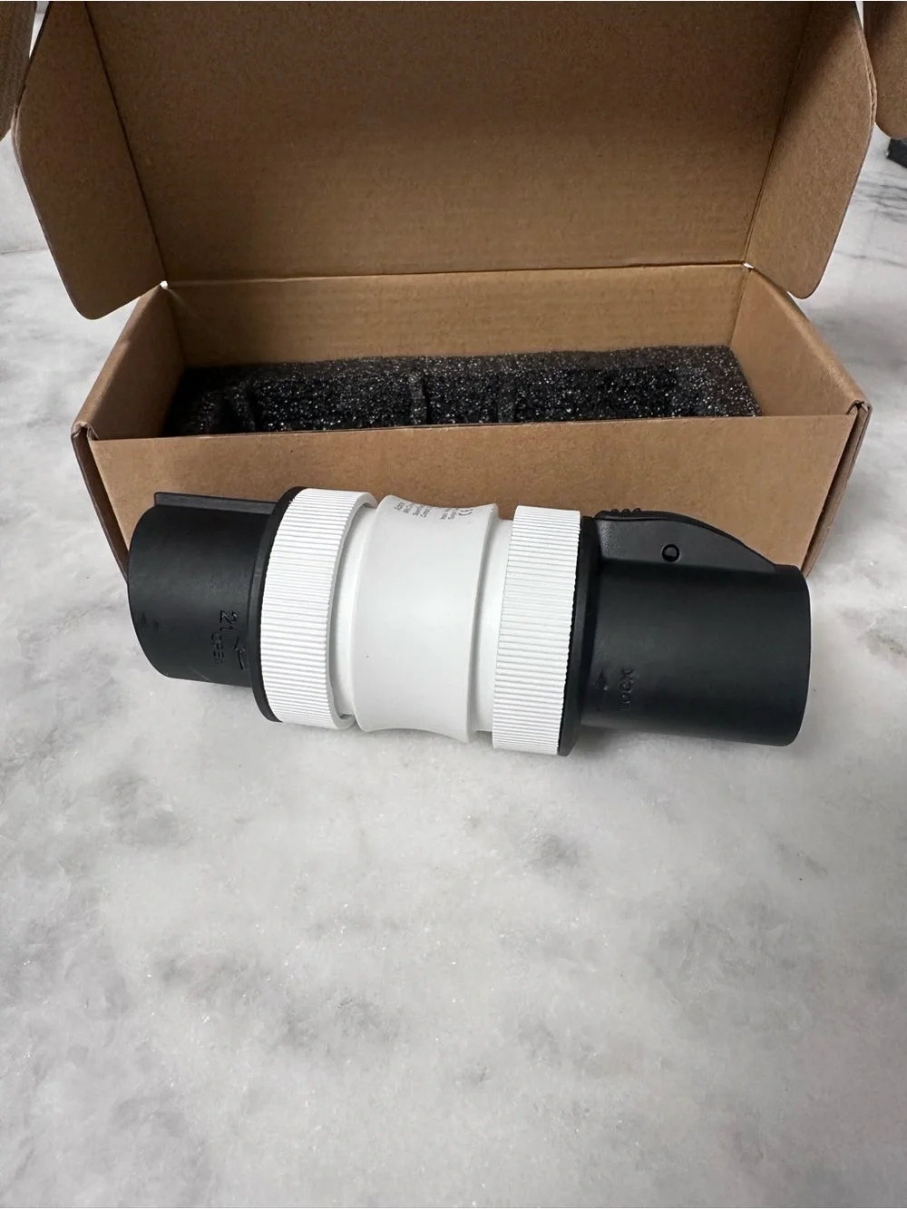 Source Unknown White and Black EV Charging Adapter Connector